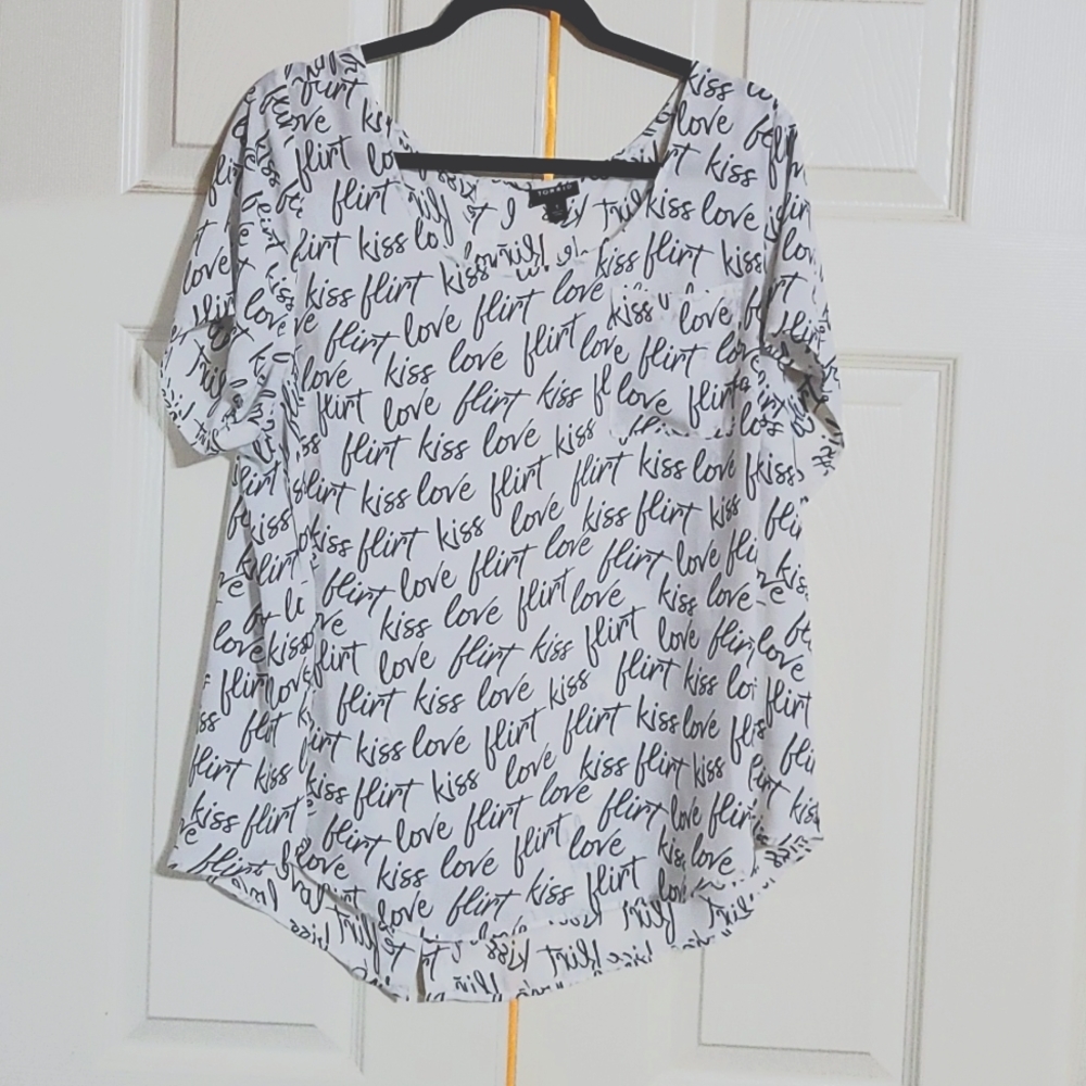 Torrid size 1 "love" printed blouse 100% polyester with buttoned down back